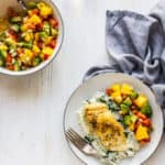 Jerk Cod with Mango Salsa | Raising Sugar Free Kids - a delicious, light and super simple dinner that is really affordable! Sugar free, gluten free, dairy free and yummy, this Jerk cod with mango salsa also has a low carb option and is made with frozen fish to keep it budget-friendly. #sugarfree #glutenfree #fish