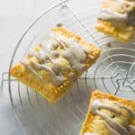Sugar Free Pumpkin Pie Pop-Tarts | Raising Sugar Free Kids - delicious flaky pastry filled with warming, sweet pumpkin pie filling and finished with a yogurt pumpkin spice glaze. These pop-tarts are delicious, and they just happen to also be sugar free! #sugarfree #pumpkin #fall