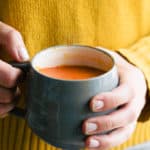 Sweet & Spicy Tomato Soup | Raising Sugar Free Kids - a sweet and lightly spiced smoky fall soup, perfect for Halloween, Bonfire Night or Thanksgiving. Delicious served in a large mug with a good chunk of homemade bread and cheese. Gluten free, sugar free and vegan. #glutenfree #sugarfree #vegan