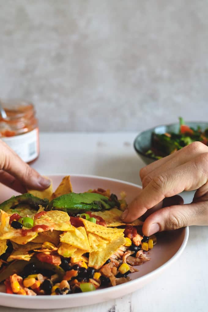Easy Veggie-Loaded Nachos Made in Just One Tray | Add Some Veg - These veggie-loaded one tray nachos make an easy dinner packed full of veg that kids (and fussy adults) will actually eat, and it’s all ready in less than half an hour! Gluten free with a vegetarian option. #glutenfree #veggieloaded #addsomeveg #nachos #easydinner #budgetdinner #kidfriendly